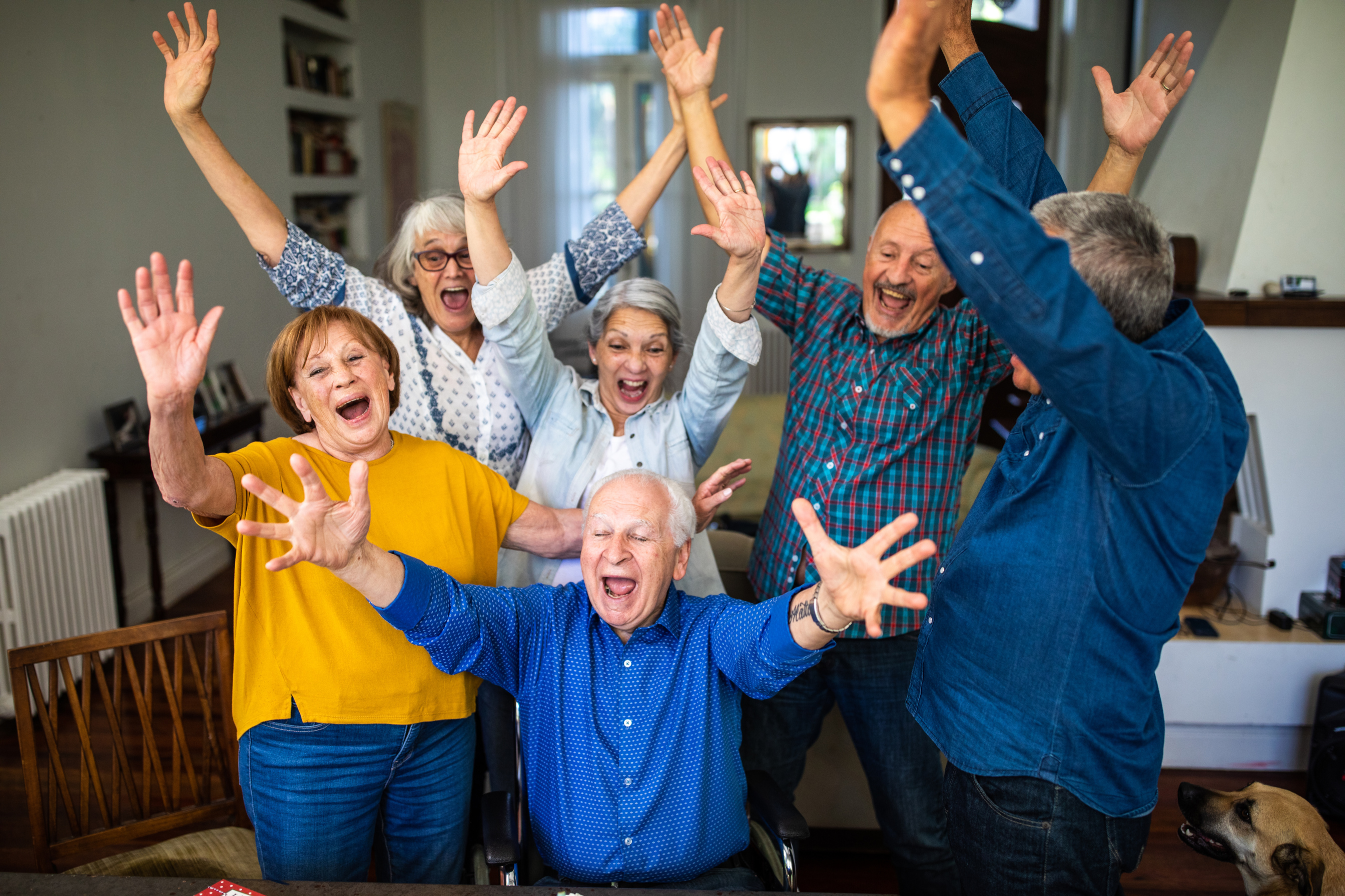 Happy senior friends at retirement home